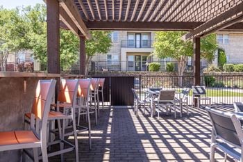 Outdoor patio with grills and al fresco dining